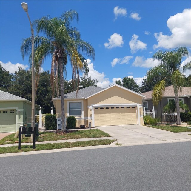 single story home with a garage