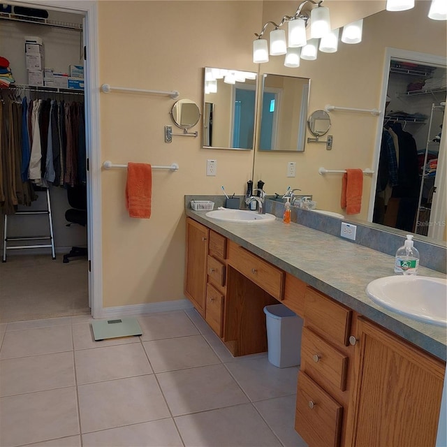 bathroom featuring tile patterned floors and vanity