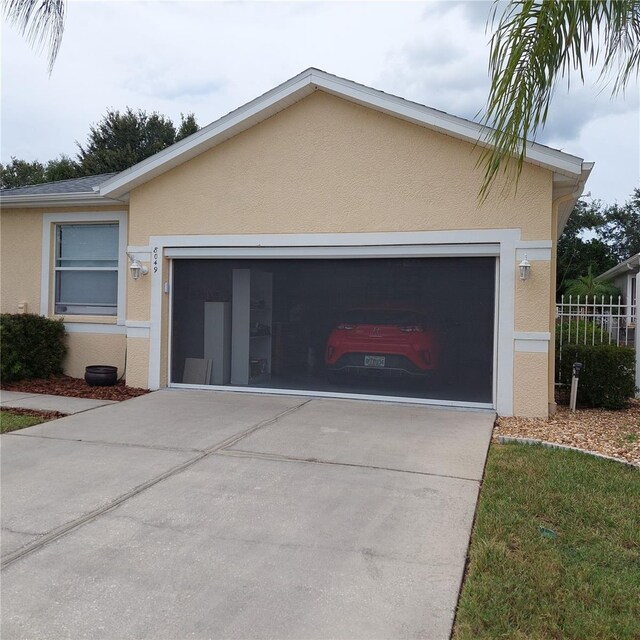 view of property exterior featuring a garage