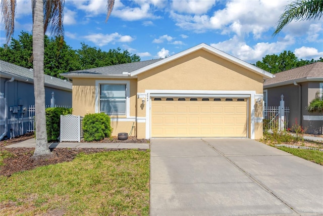 8049 Sanguinelli Rd, Land O Lakes, FL 34637 - ranch-style home featuring stucco siding, a garage, and driveway