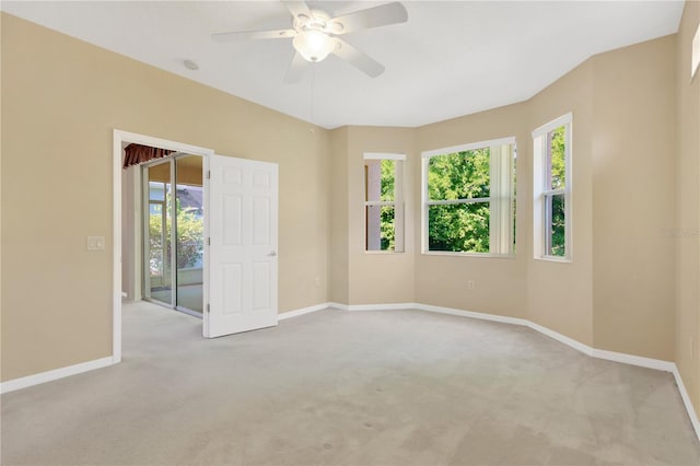 8049 Sanguinelli Rd, Land O Lakes, FL 34637 - carpeted empty room with baseboards and ceiling fan
