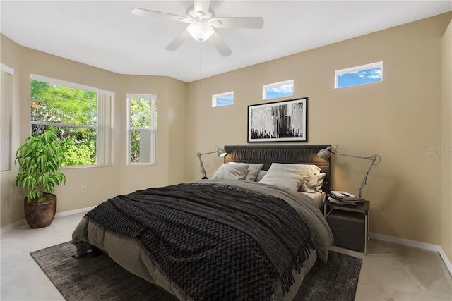 8049 Sanguinelli Rd, Land O Lakes, FL 34637 - bedroom with light carpet, baseboards, and multiple windows