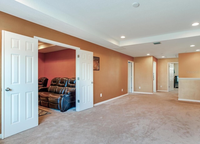 interior space featuring light colored carpet