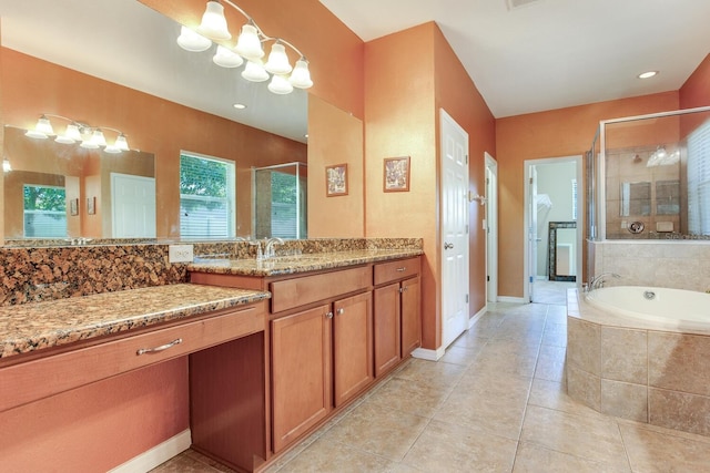 bathroom with separate shower and tub, tile floors, and vanity