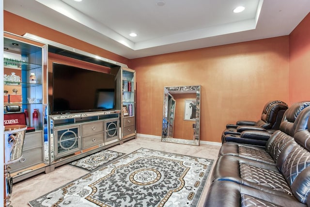 living room featuring a raised ceiling