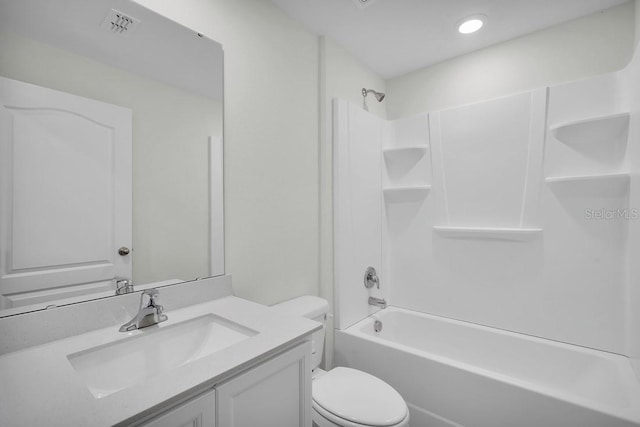 full bathroom featuring shower / washtub combination, toilet, and vanity