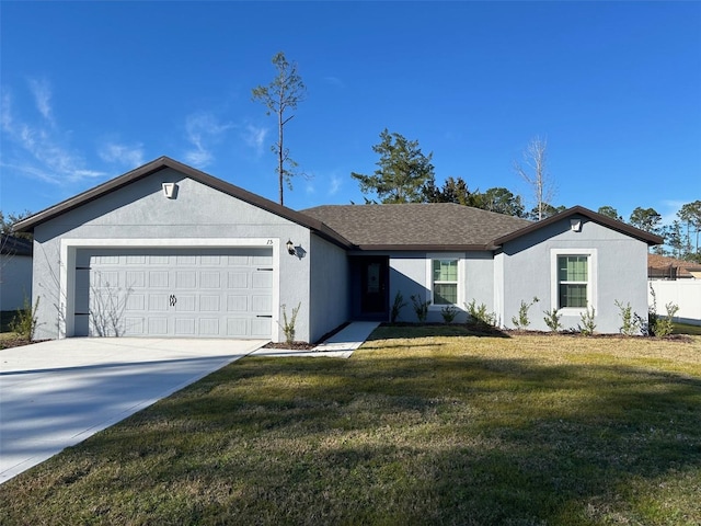 ranch-style house featuring a front lawn and a garage