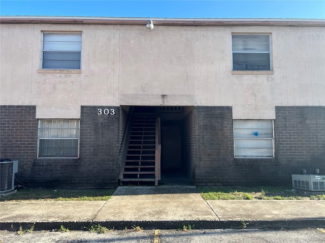 view of front of home with central AC unit