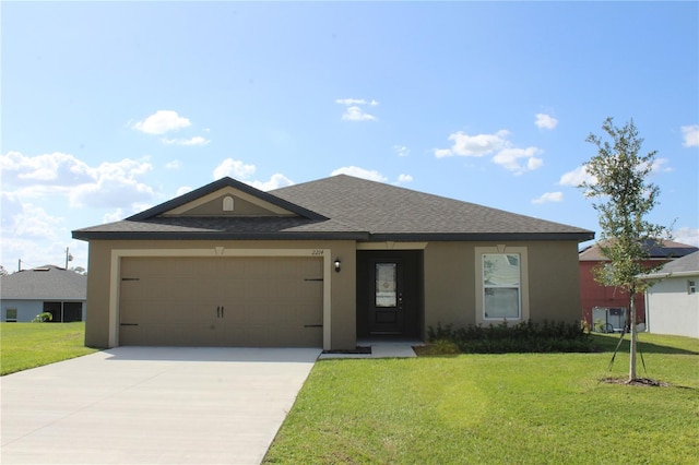 ranch-style house with a garage and a front lawn