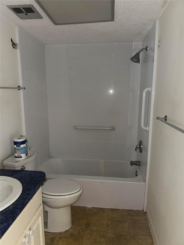 full bathroom featuring vanity, tile flooring, a textured ceiling, shower / bathtub combination, and toilet