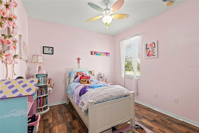 bedroom featuring ceiling fan and dark hardwood / wood-style floors