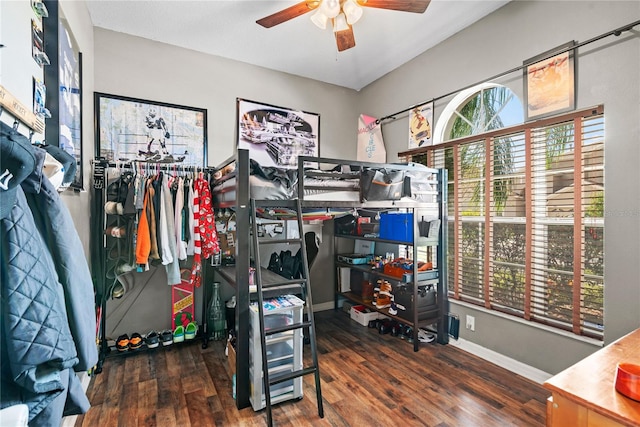 bedroom featuring ceiling fan and dark hardwood / wood-style floors