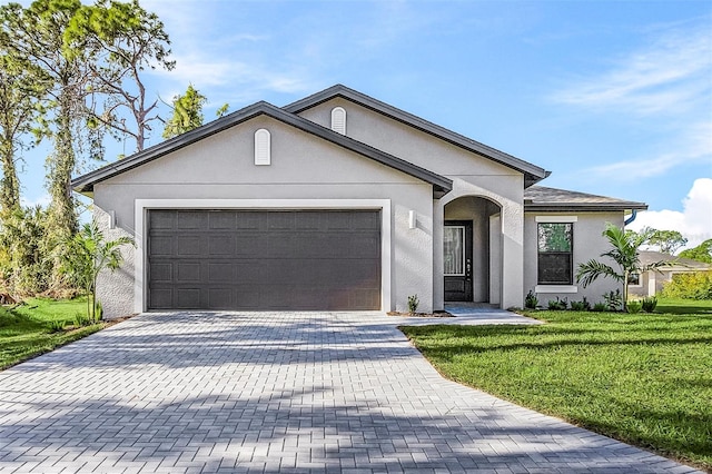 ranch-style house with a garage and a front lawn