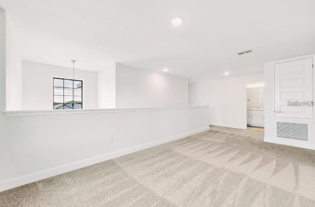 7002 162nd Pl E, Parrish, FL 34219 - carpeted spare room with recessed lighting, visible vents, baseboards, and a notable chandelier