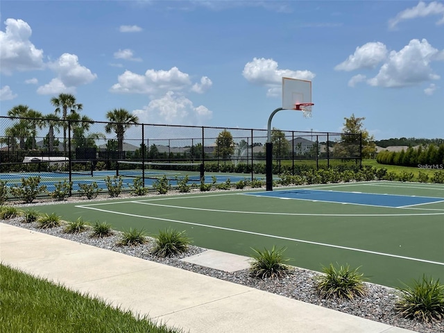 7002 162nd Pl E, Parrish, FL 34219 - view of basketball court featuring community basketball court, a tennis court, and fence