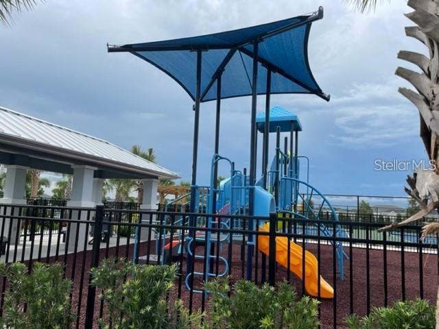 7002 162nd Pl E, Parrish, FL 34219 - community play area with fence