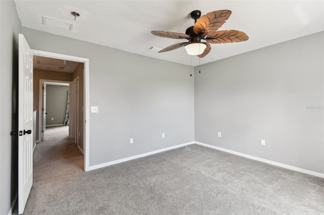 unfurnished room featuring light carpet and ceiling fan