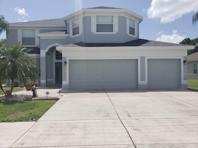 view of front of home featuring a garage