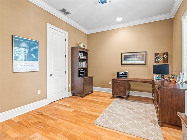 office area featuring ornamental molding and light hardwood / wood-style flooring