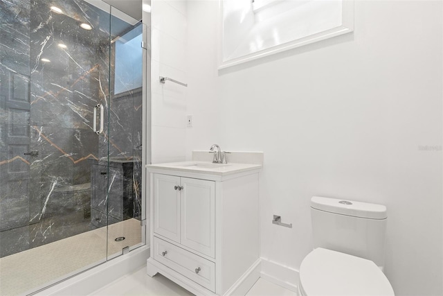 bathroom featuring an enclosed shower, toilet, and vanity