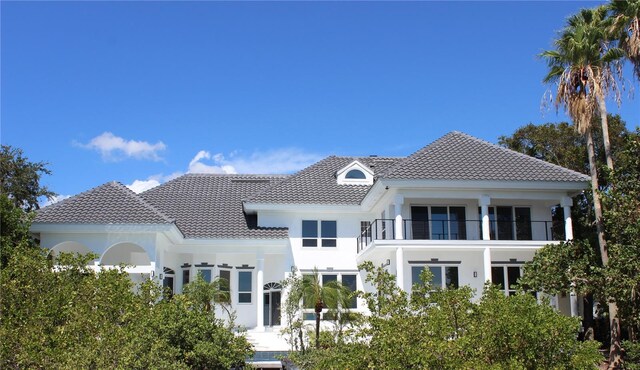 rear view of house with a balcony