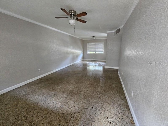 spare room featuring a textured ceiling and ceiling fan