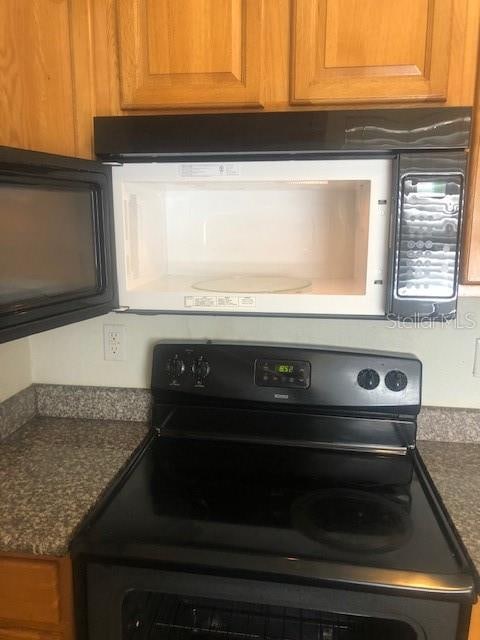 interior details featuring stainless steel electric range oven