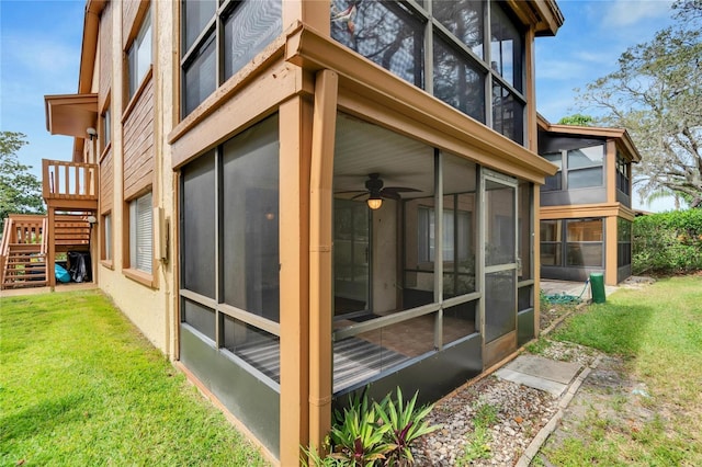 view of side of home featuring a lawn