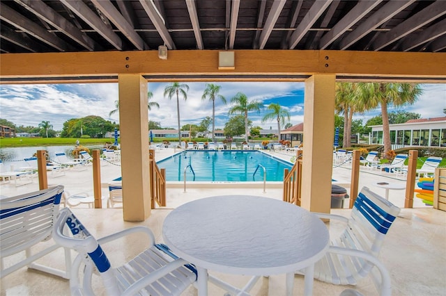 view of swimming pool with a patio area