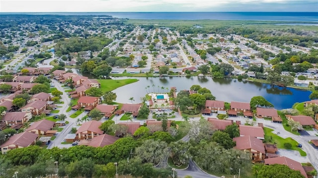 drone / aerial view with a water view