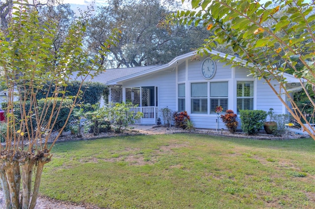 exterior space featuring a yard