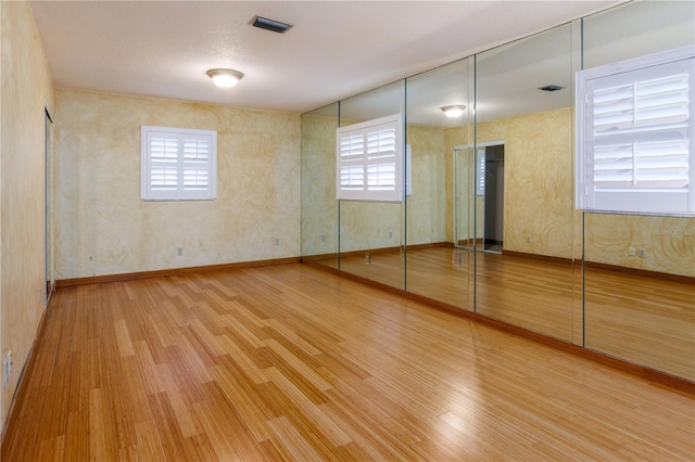 unfurnished bedroom featuring light hardwood / wood-style floors