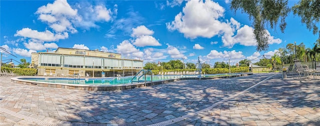 view of pool with a patio area