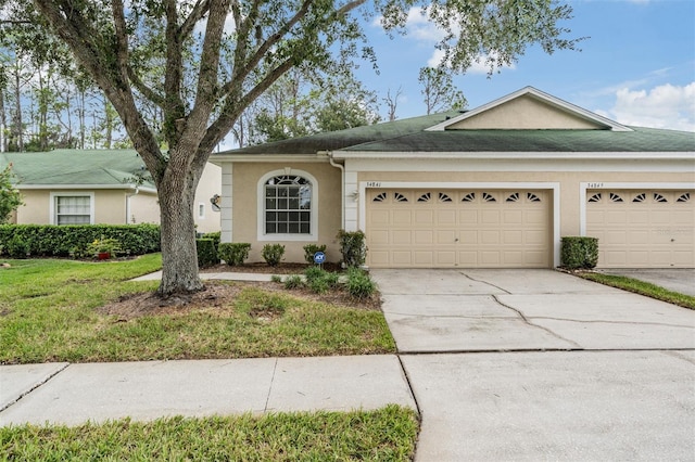 ranch-style home with a garage