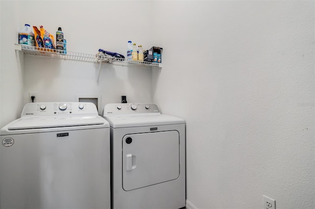 laundry room featuring washer and clothes dryer