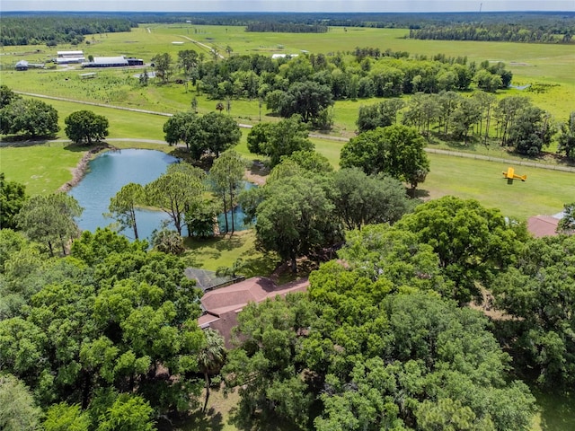 drone / aerial view featuring a rural view and a water view