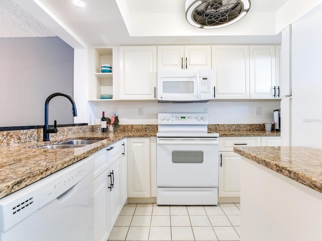 kitchen featuring open shelves, light tile patterned flooring, white appliances, white cabinetry, and a sink