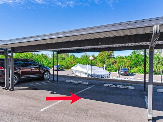 view of parking featuring a carport