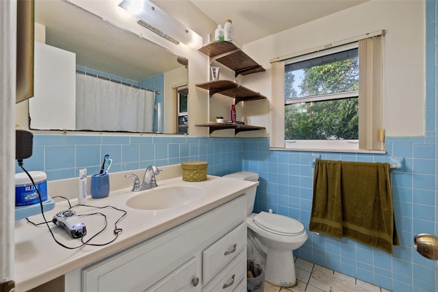 bathroom featuring tile walls, tile floors, backsplash, and large vanity