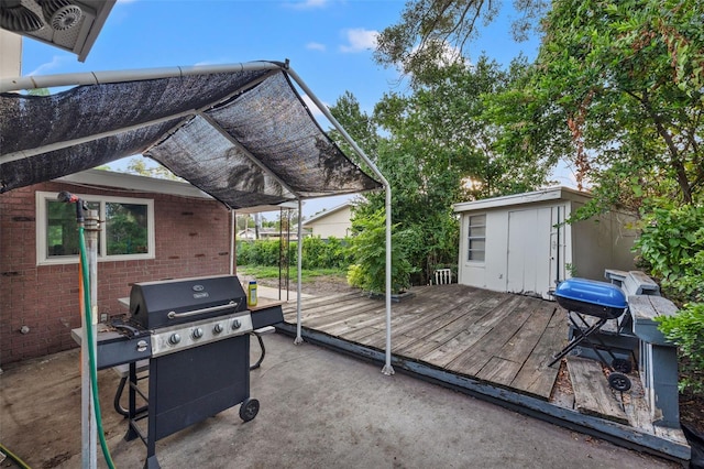 wooden deck with grilling area