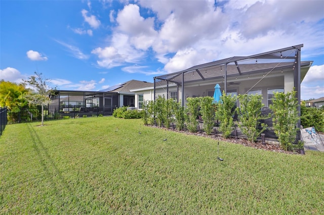 view of yard featuring a lanai