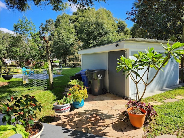 view of patio with a storage shed