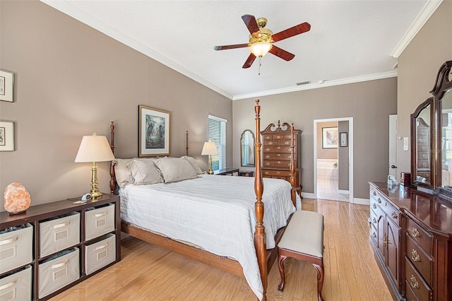 bedroom with light hardwood / wood-style floors, ceiling fan, ornamental molding, and ensuite bathroom