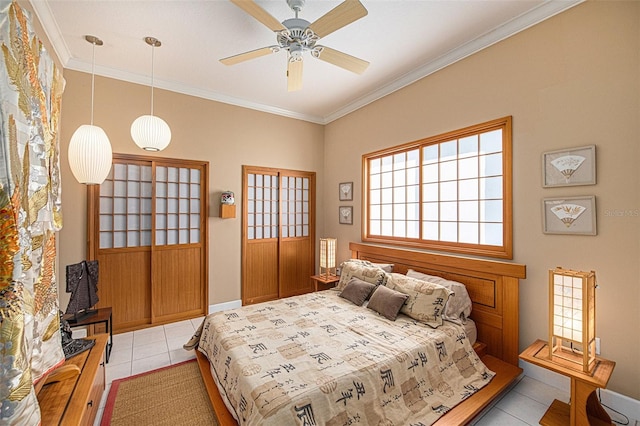 tiled bedroom featuring ceiling fan and crown molding