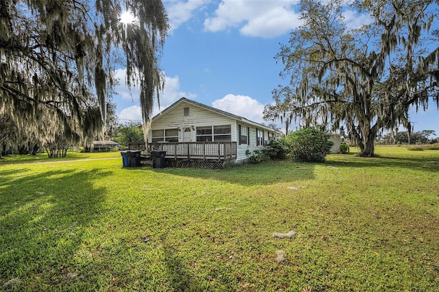 view of yard featuring a deck