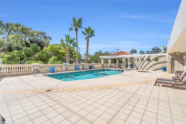 view of pool featuring a patio and a gazebo