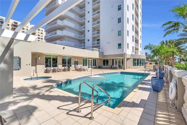 view of pool featuring a patio