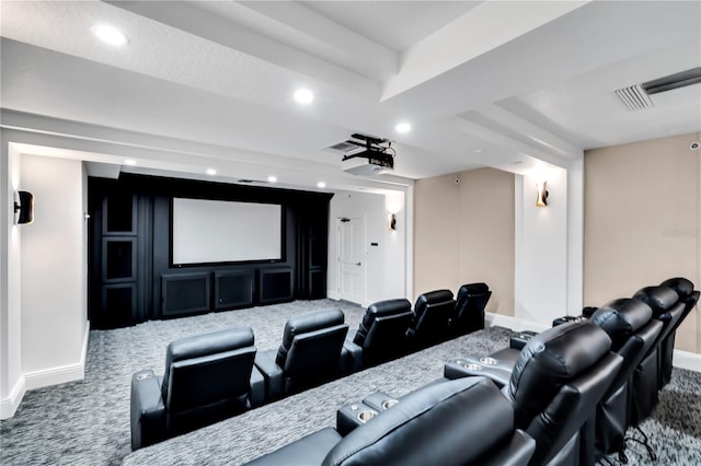 cinema room featuring carpet flooring