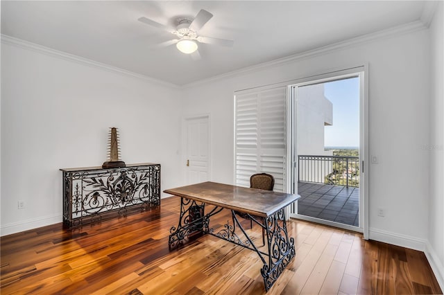 home office featuring hardwood / wood-style flooring, ceiling fan, and crown molding