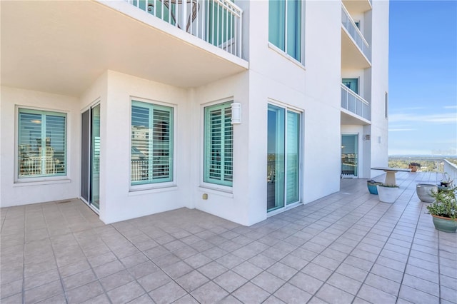 view of patio with a balcony